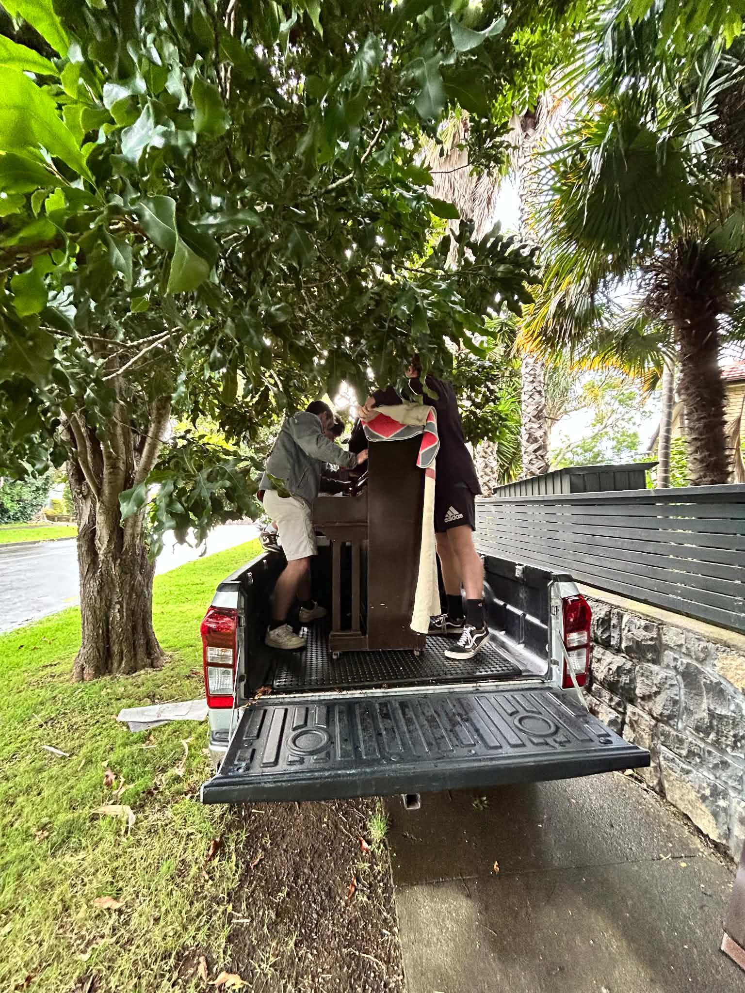 Loading the piano onto the ute